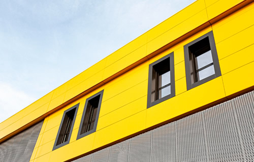 Modern building exterior featuring aluminum composite panel cladding in Nigeria.